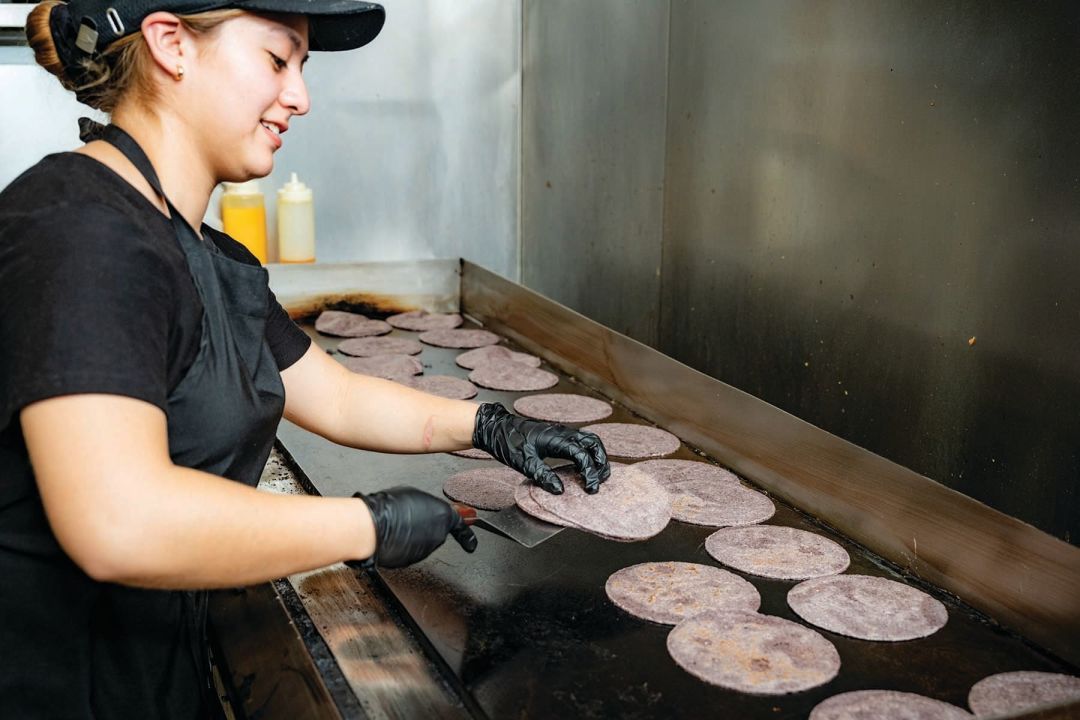 Alondra Lopez prepares scratch-made tortillas, the foundation of every Casa Masa dish.