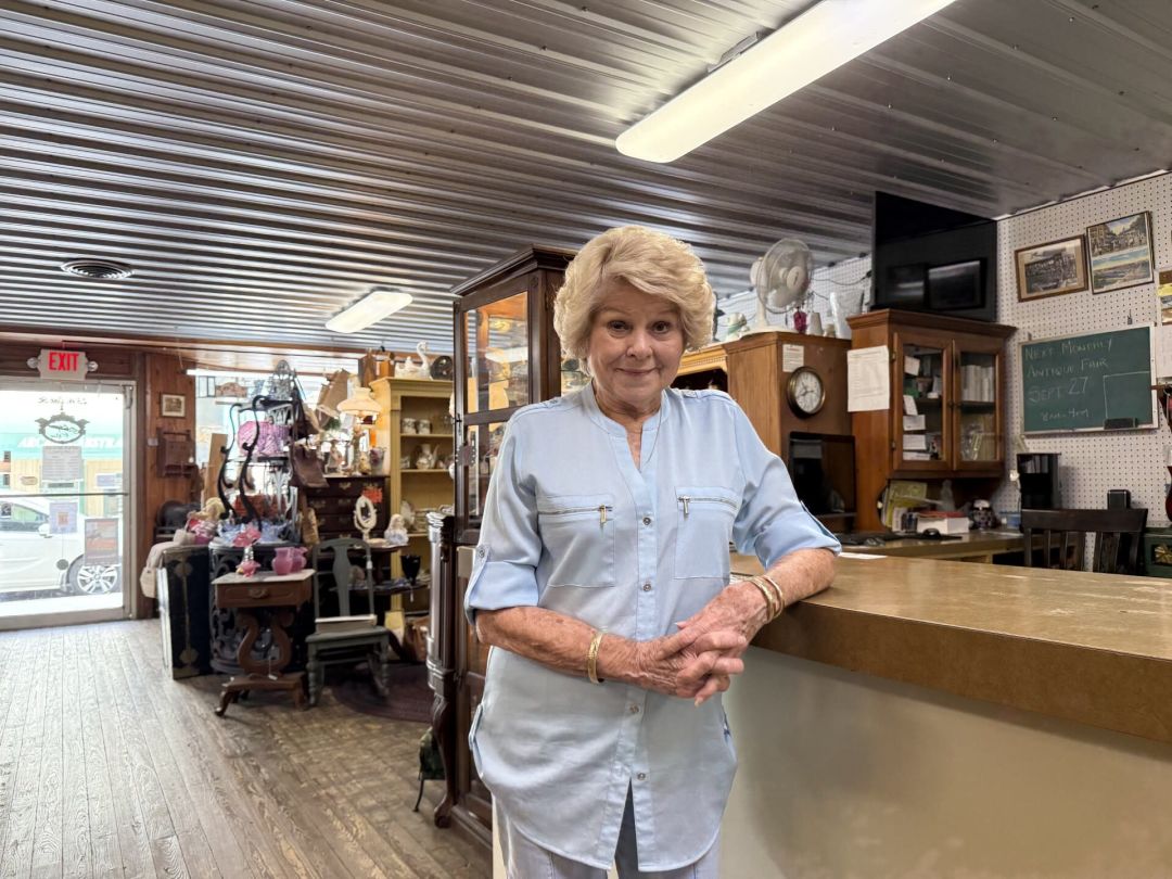 Glenda Lewis stands inside the Morgan Building, built in 1906, as she waited on an A/C technician last month. Lewis bought the building in 2002 and has operated the antique shop for more than 20 years, recently joining Arcadia Main Street's economic development committee.