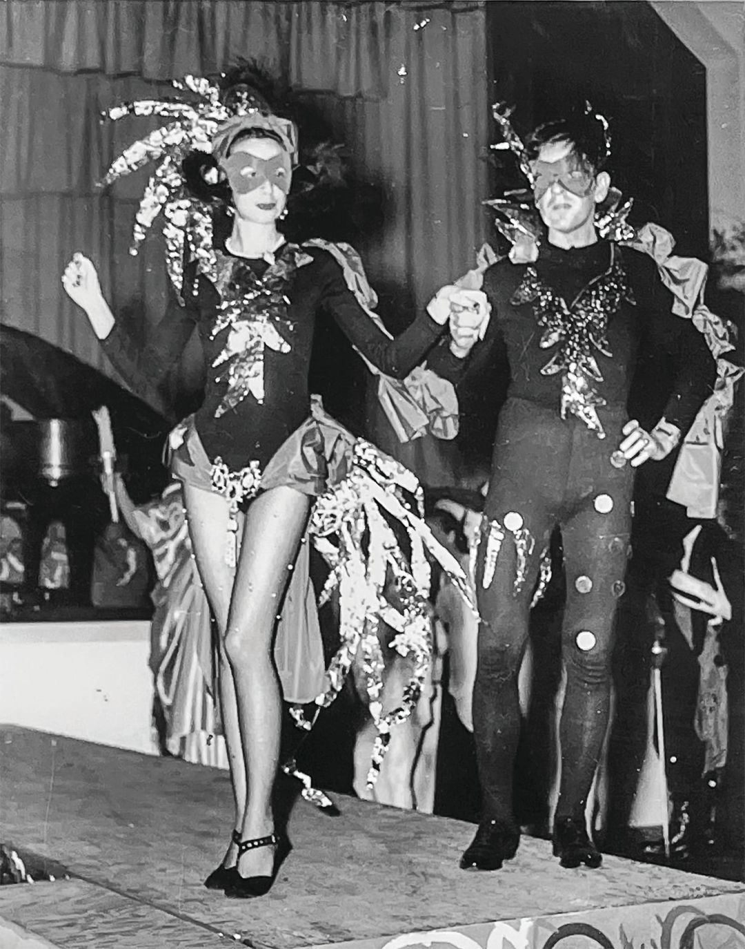 A couple decked out in costumes made with foil at a Beaux Arts Ball in 1953.