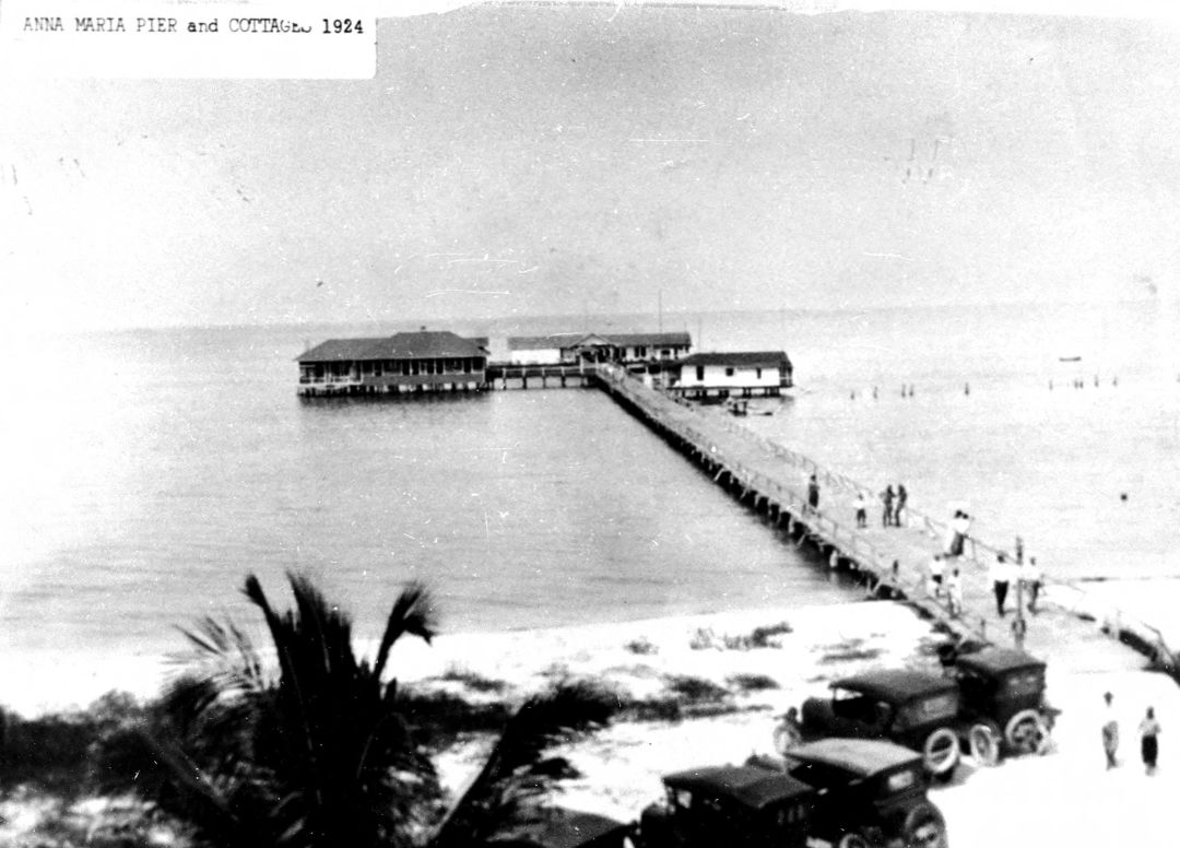 The historic Anna Maria Pier in 1924, with cottages on either side of the walkway.