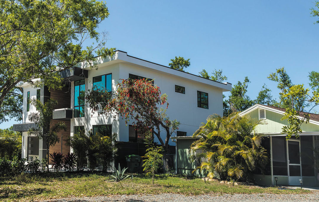 All around Sarasota, smaller wood frame homes are giving way to larger concrete builds.