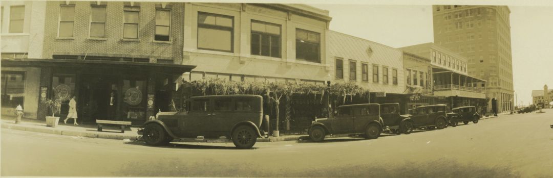 Looking west down Main Street in 1928 with the American National Bank (now the Orange Blossom Tower) on the left and Hover Arcade (once Sarasota’s city hall) on the Municipal Pier in the distance.