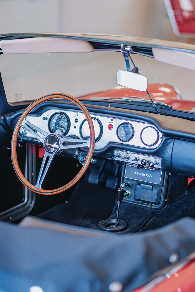 The sleek dashboard of one of Tretreault's Hondas.