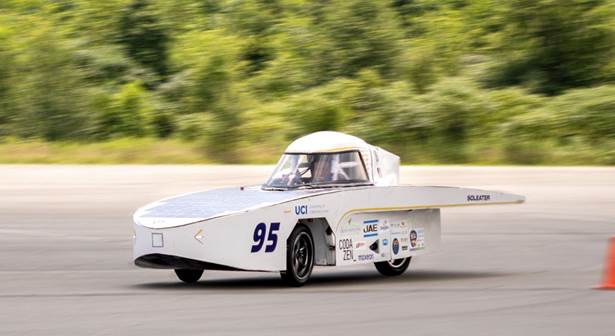 Action shot of SolEater driving - the car is clear, but the background is blurred