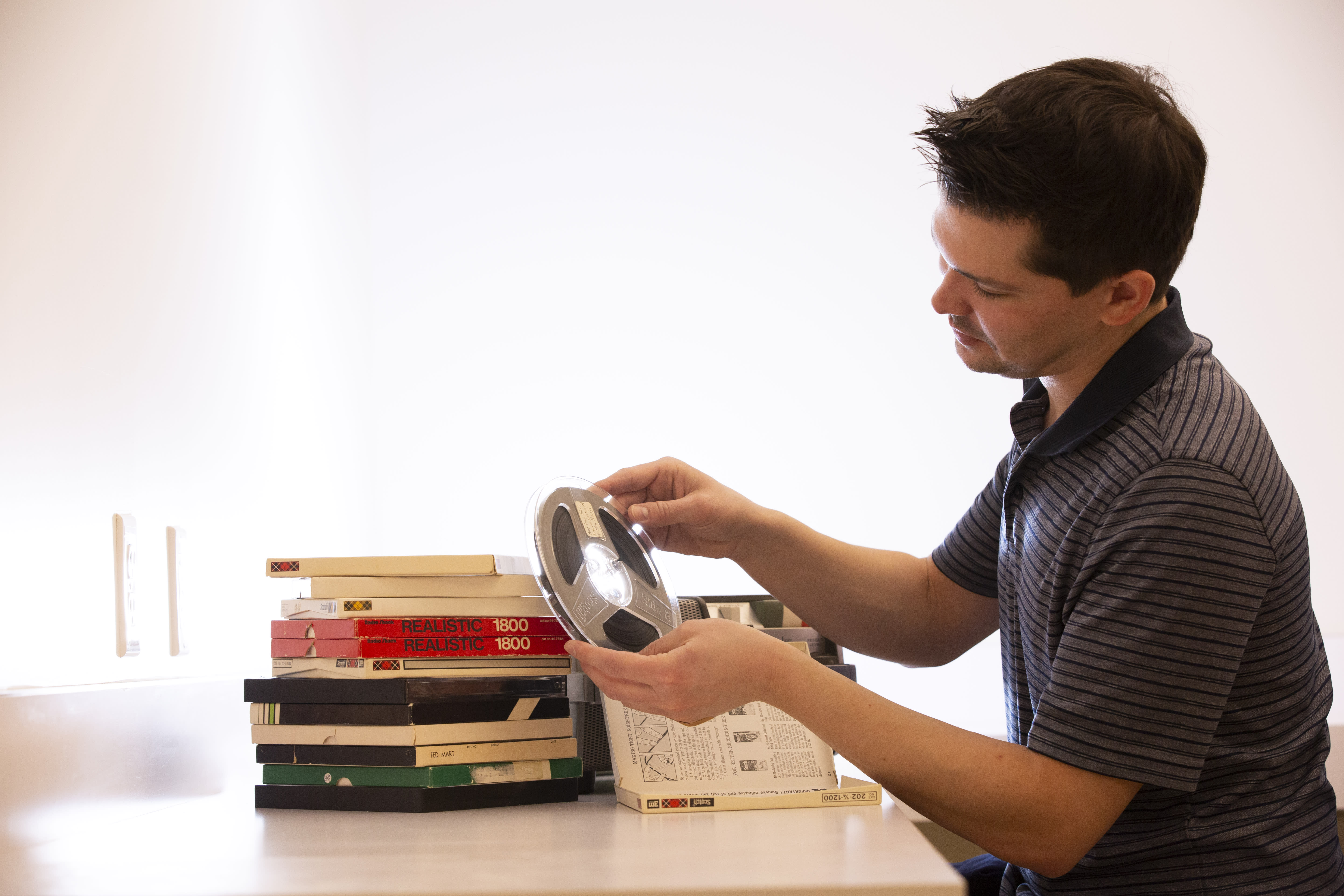 student studying artifacts