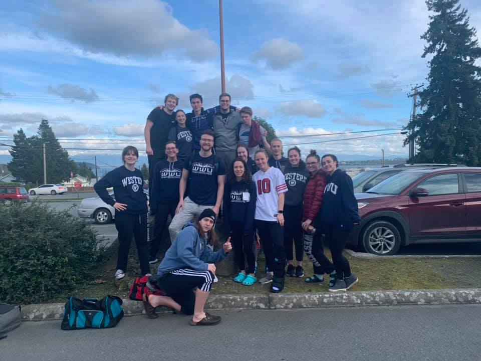 Image may contain: 3 people, including Jordan Anderson and Frances Vail, people smiling, people standing, sky and outdoor