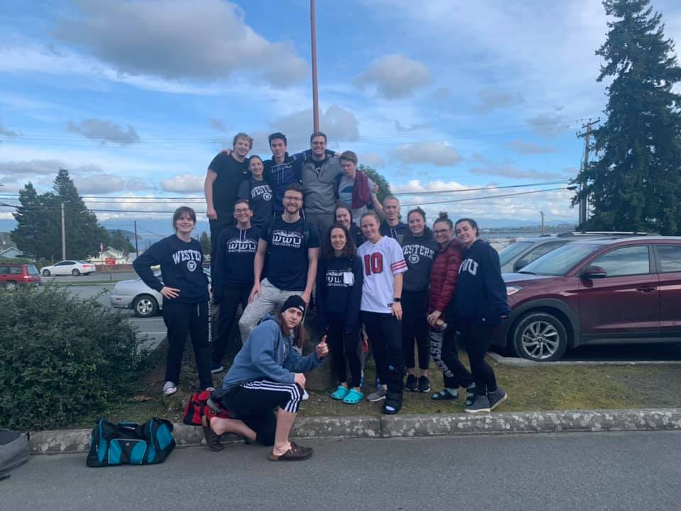 Image may contain: 3 people, including Jordan Anderson and Frances Vail, people smiling, people standing, sky and outdoor