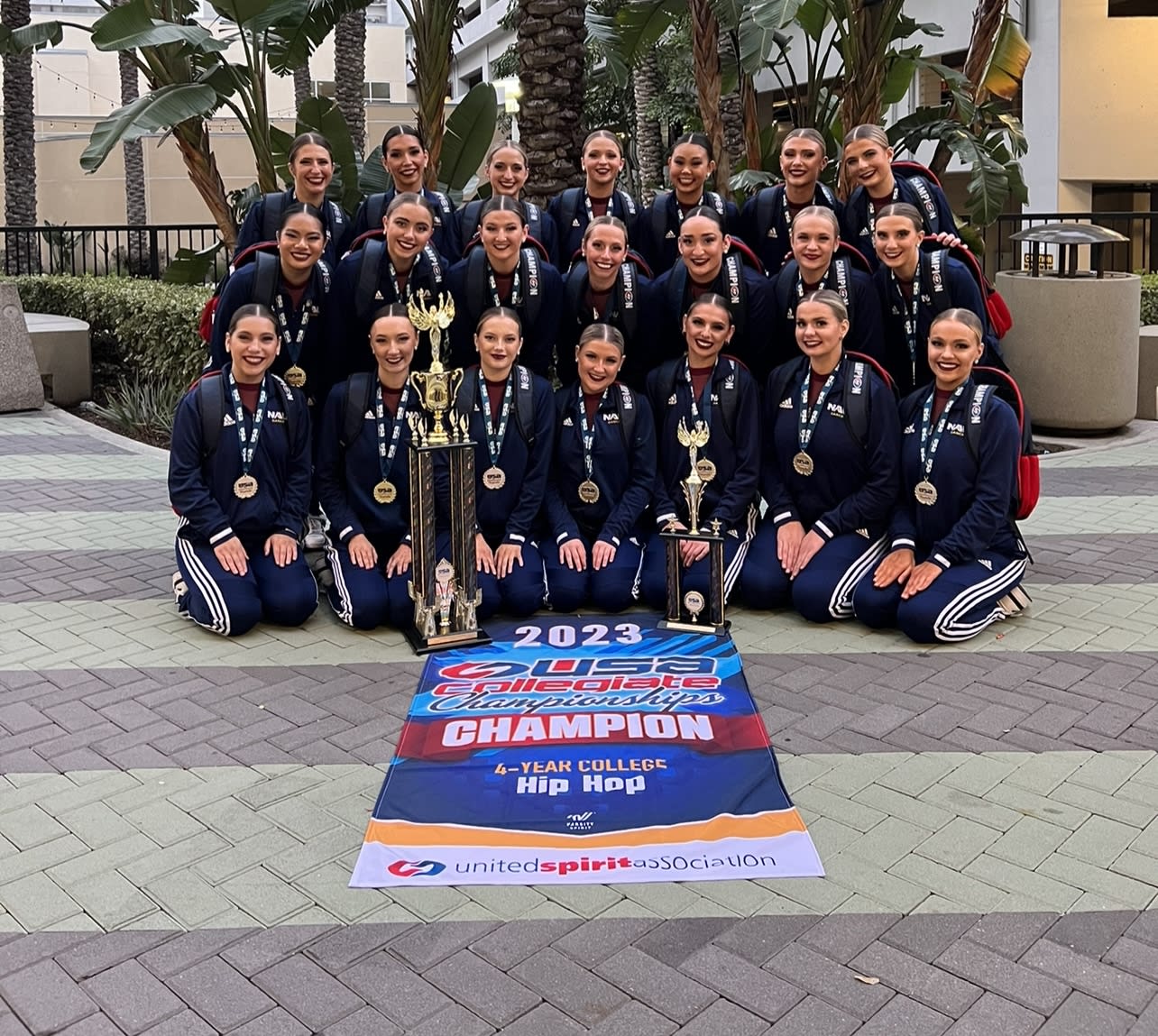 Dance team poses at competition 