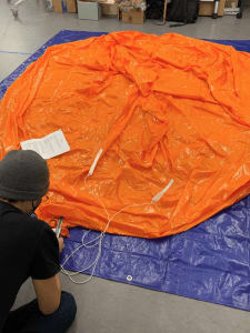 Air Subteam member Sam Jurado working on the Weather Balloon