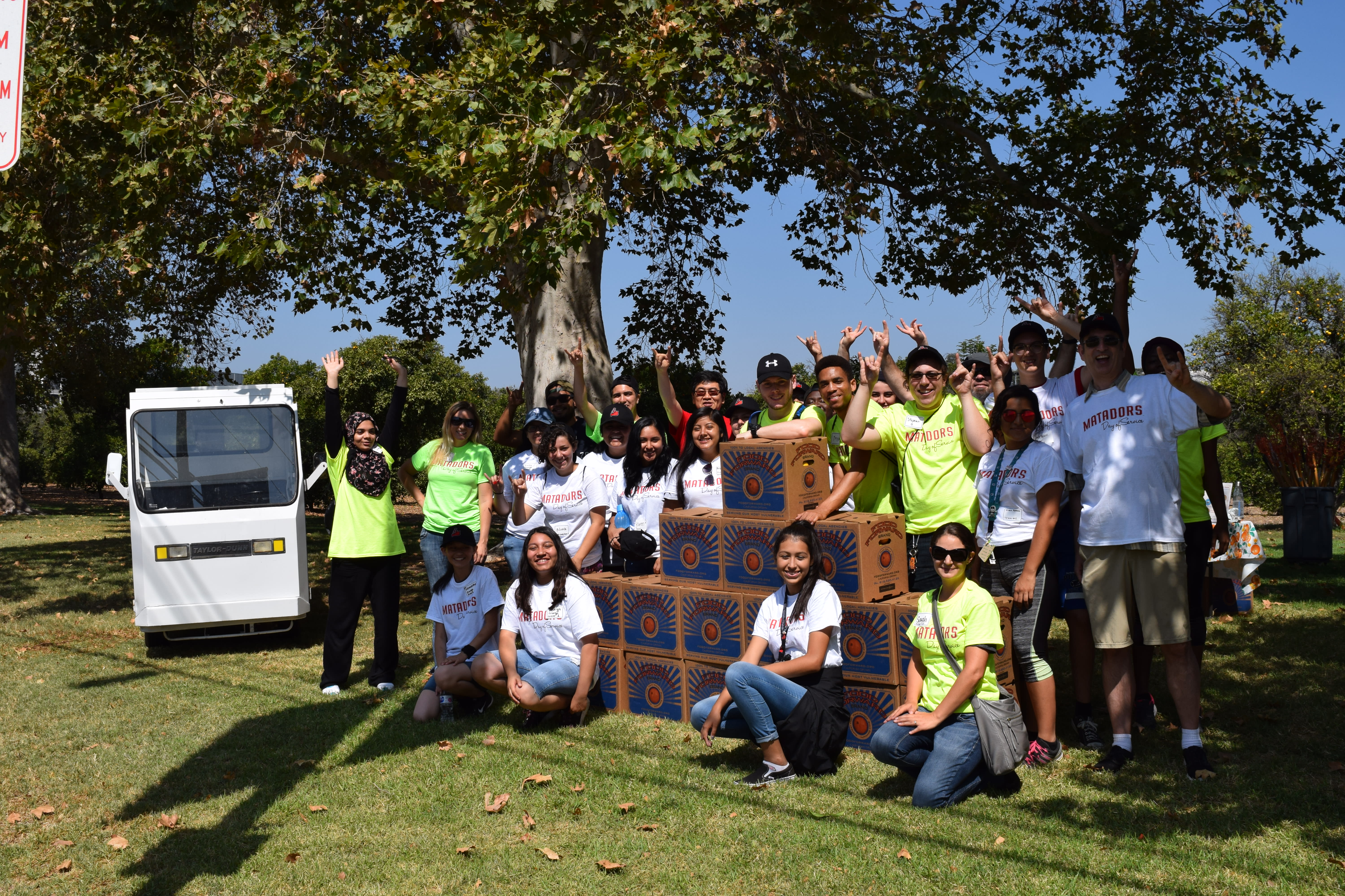 Matadors Day of Service orange pick