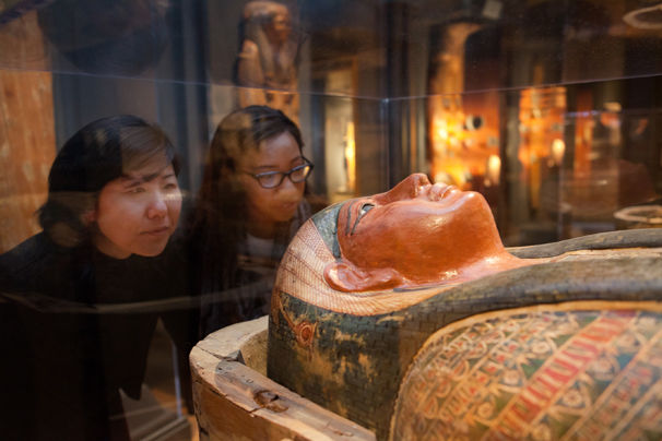 School children observe a mummy at the Carlos Museum 