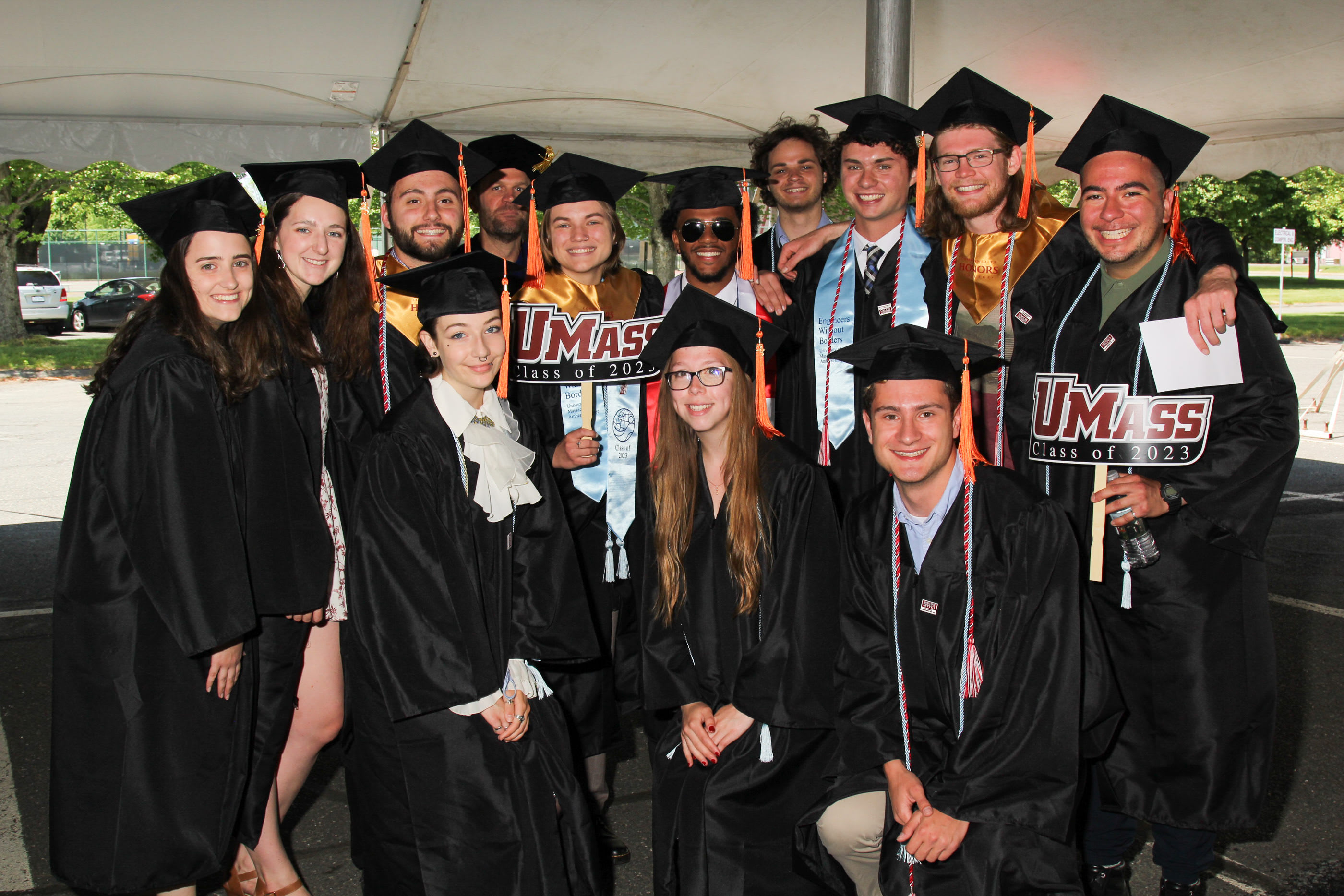 Engineering students celebrating in caps and gowns