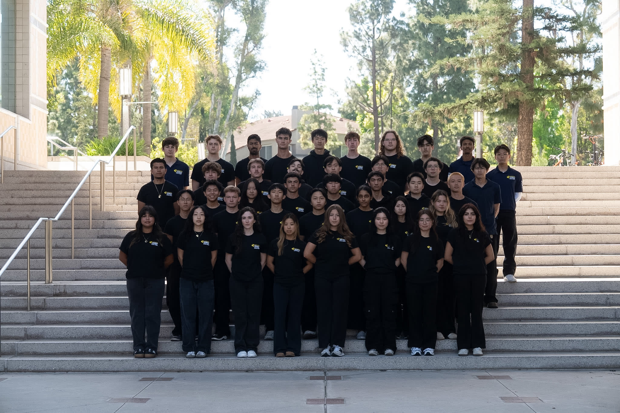 Group picture of the team in matching uniforms.