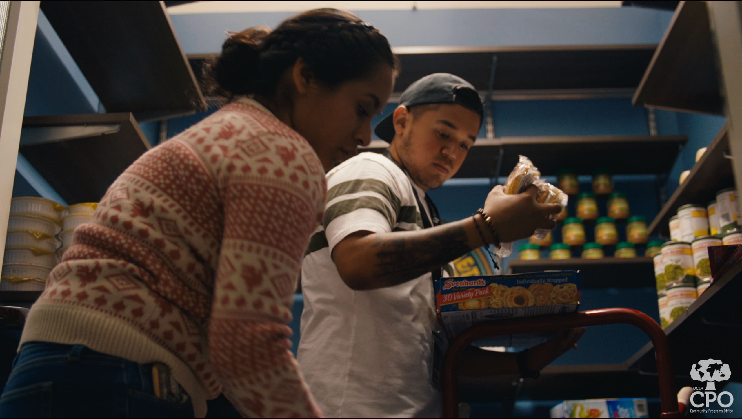 Students stocking the CPO Food Closet