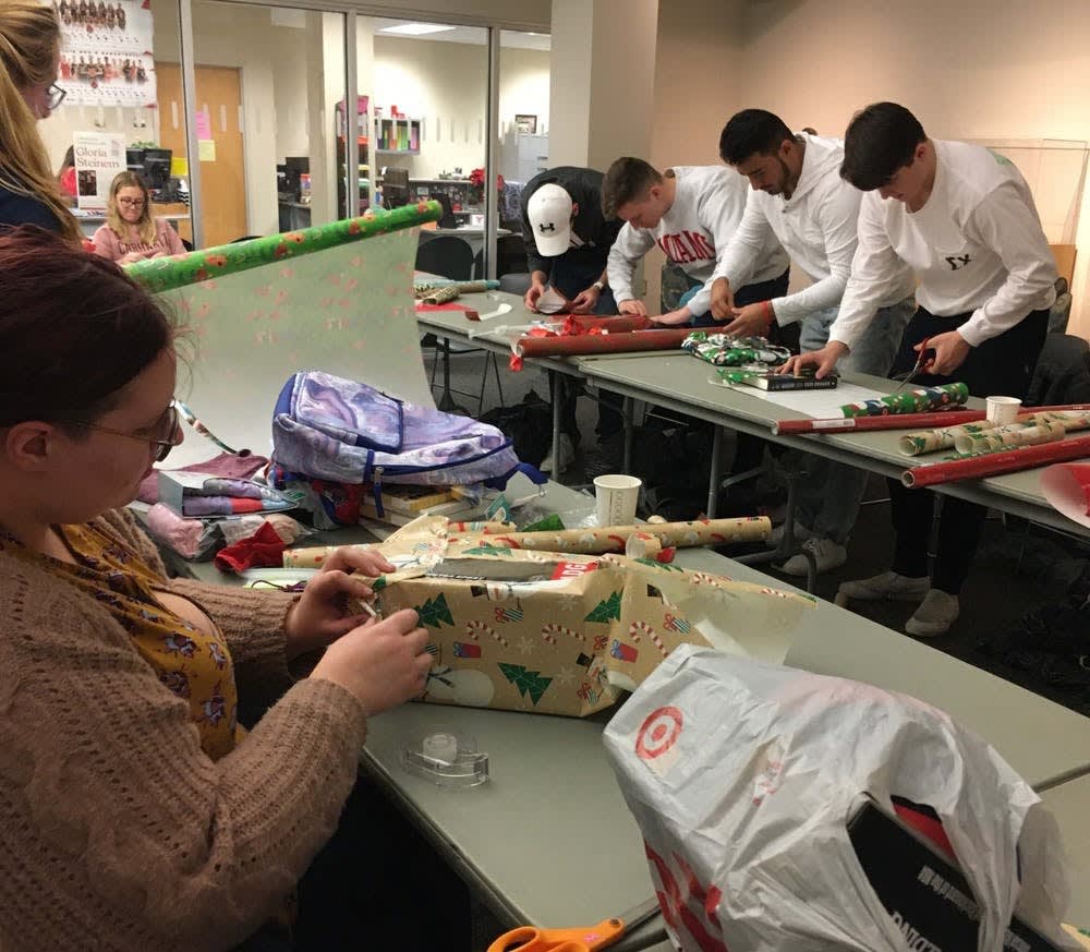 <p>Students help wrap donated gifts for Ball State’s Student Voluntary Services’ annual Angel Tree event Dec. 3, 2019. More than 351 children will receive gifts for the holiday season because students, staff and community members volunteered to sponsor them. <strong>Tier Morrow, DN </strong></p>