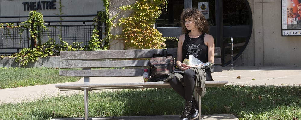 Image: NKU student sitting outside