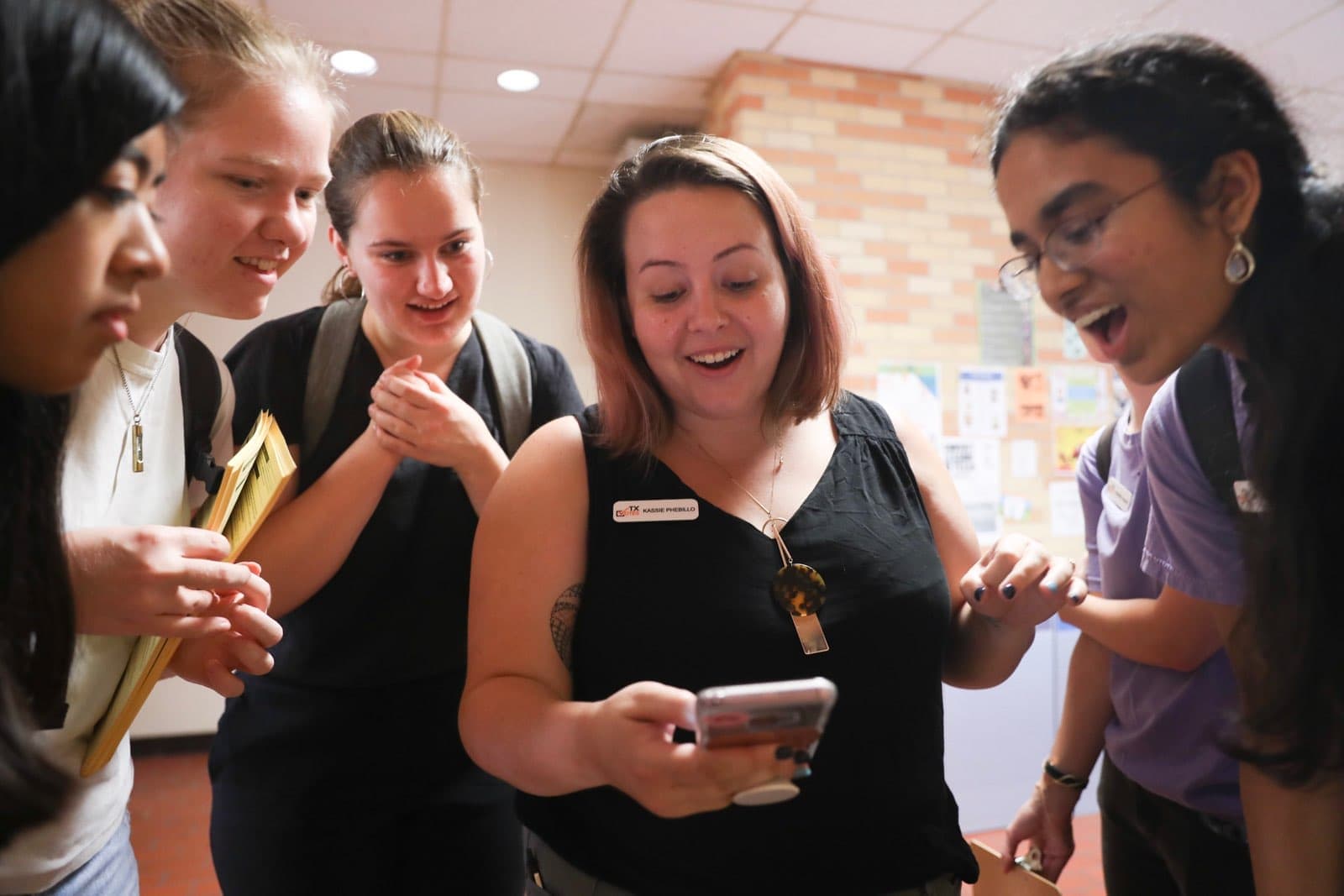 TX Votes members read their 2018 NSLVE report for the first time.