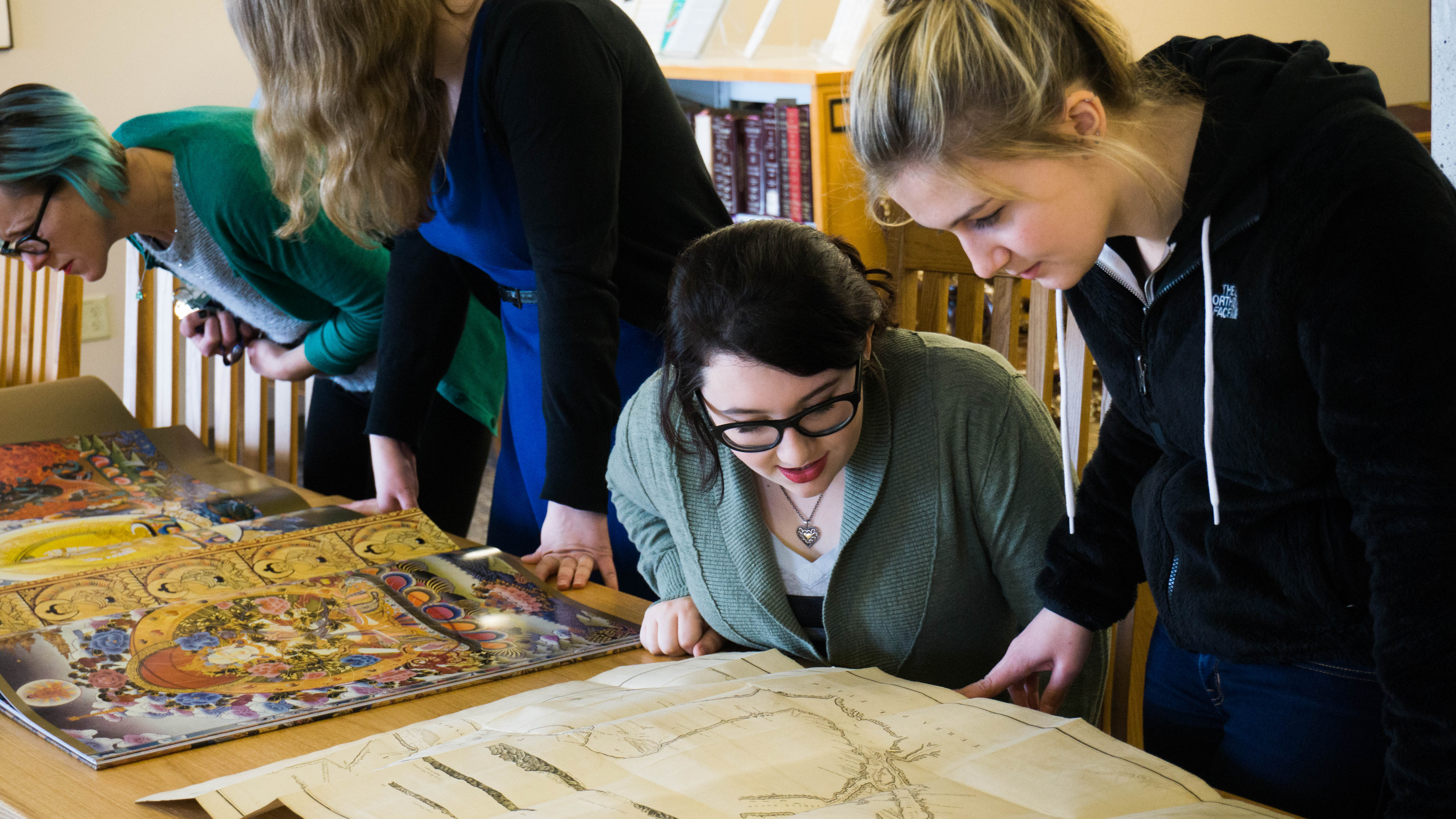 Students looking at items from Special Collections