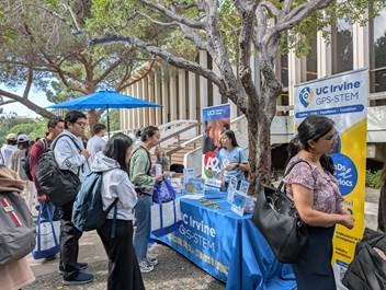 Students visiting the UCI GPS-STEM booth on campus.