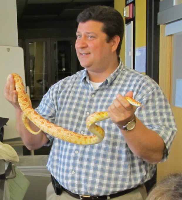 Dr. Kues with a live snake