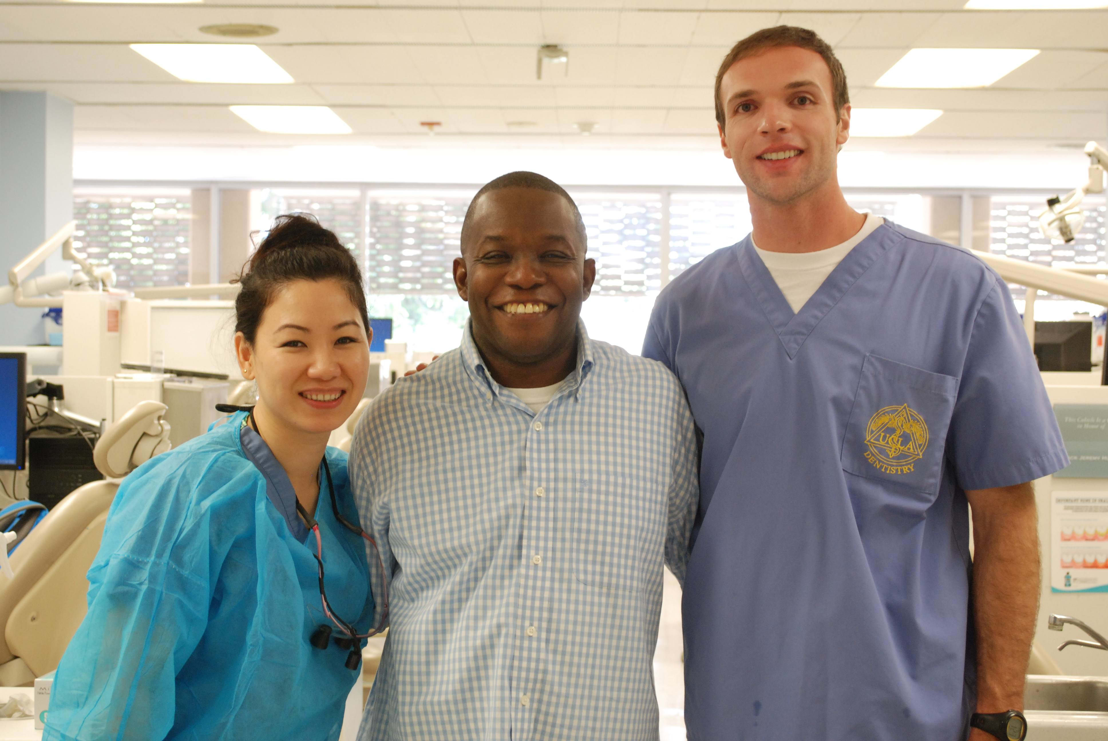 Operation Bruin Smiles patient, UCLA student veteran Rodrick F., shows off his new smile with Co-Founders Tigon Abalos and Brian Lehigh