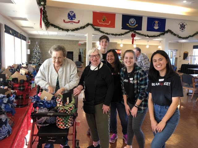 Photo of veterans with our blankets