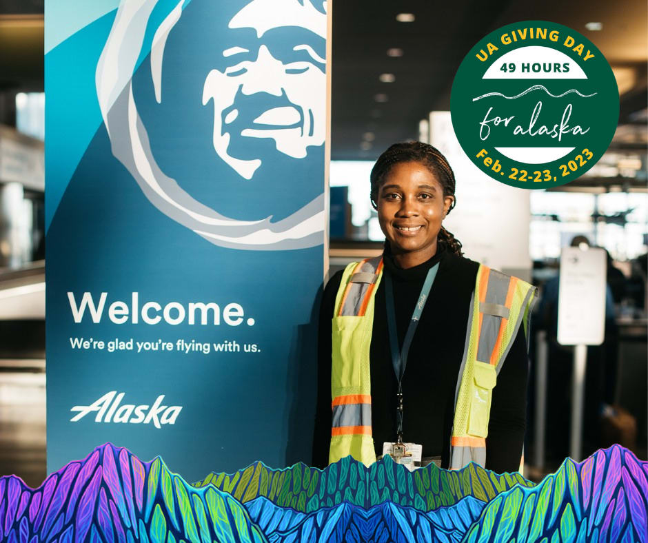 Valerie Clark, CTC alum, standing at the airport in front of Alaska Airlines sign