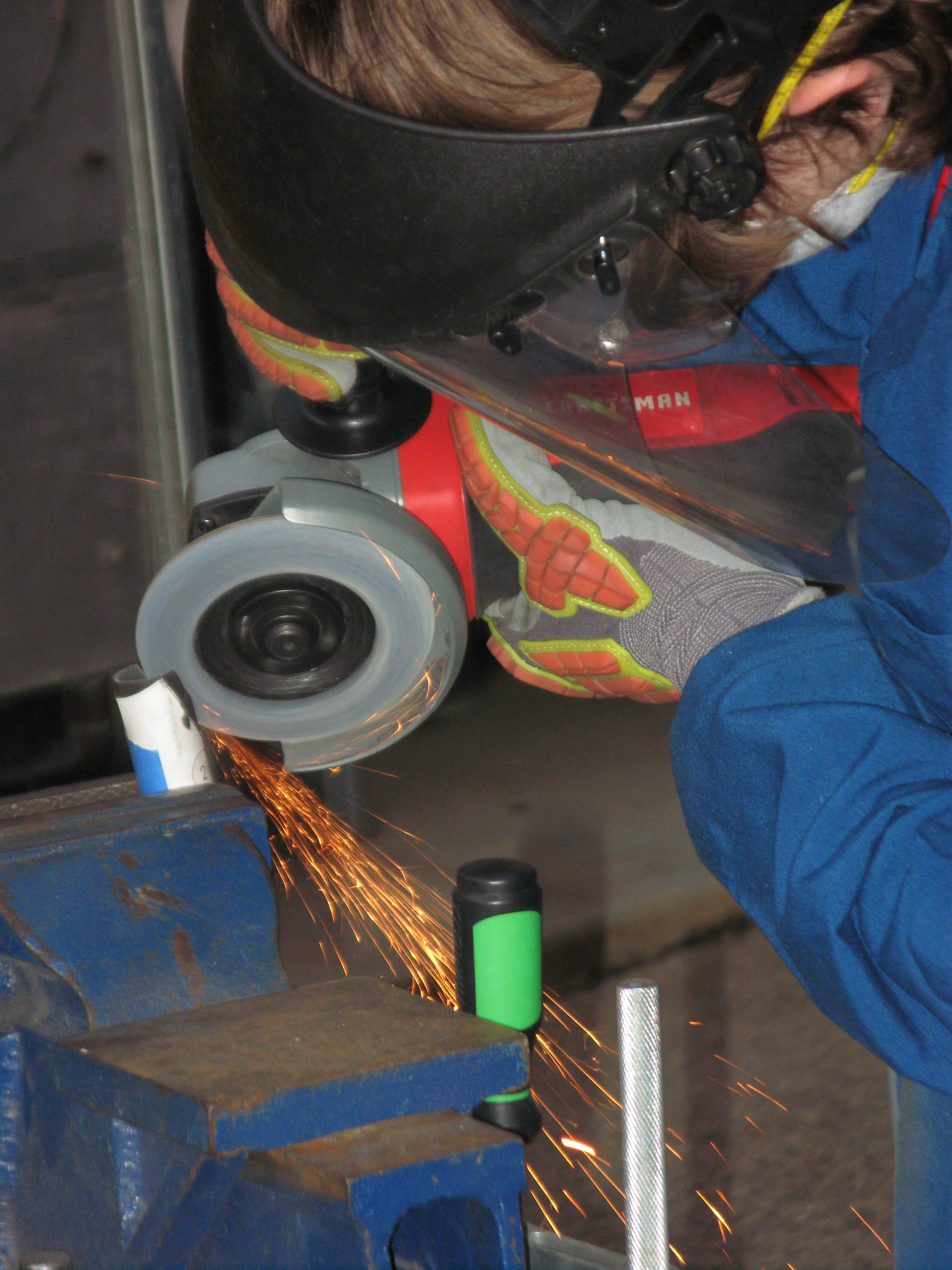 Angle grinding control arms in lab