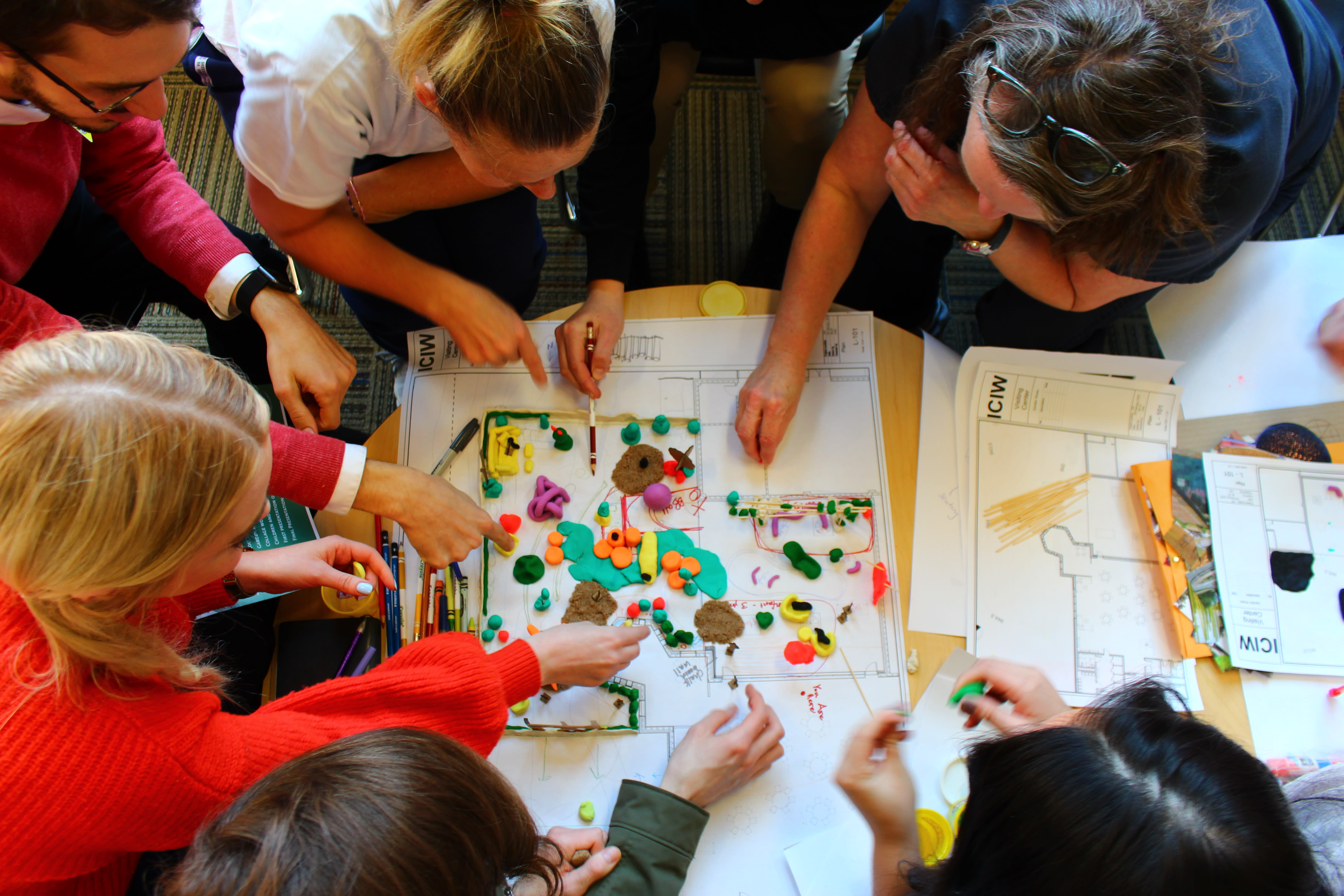 Students and women designing the space