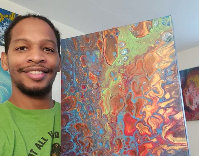 A person smiling in front of a map

Description automatically generated with low confidence