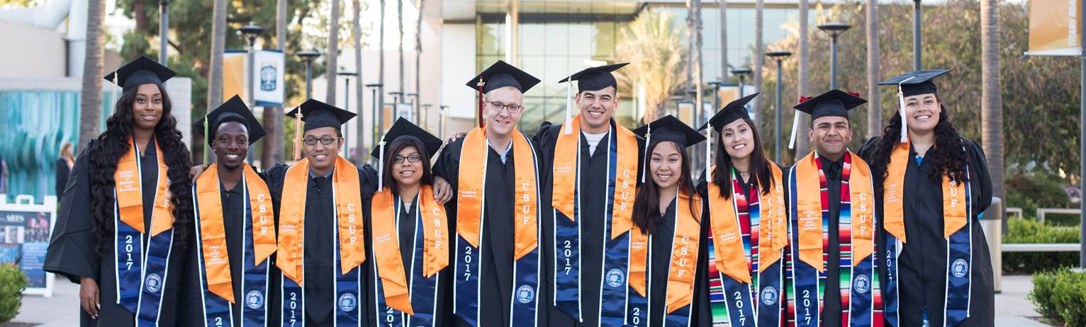 10 students in cap and gown