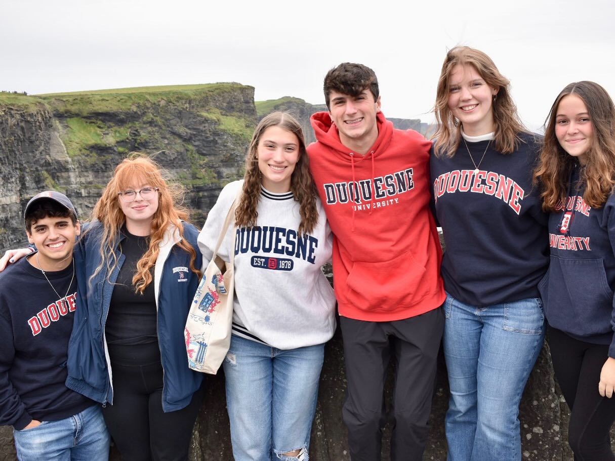 study abroad students smiling in a group