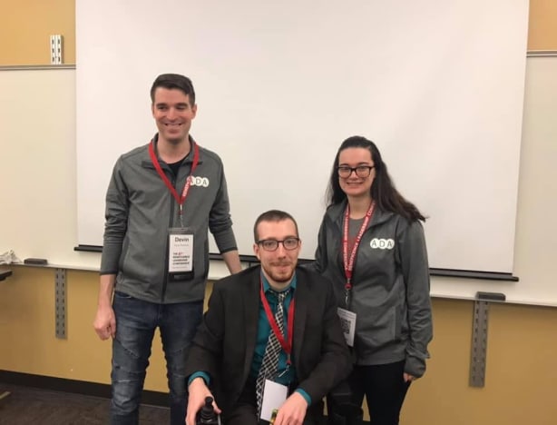 Three students gathered after an Alliance for Disability Awareness event