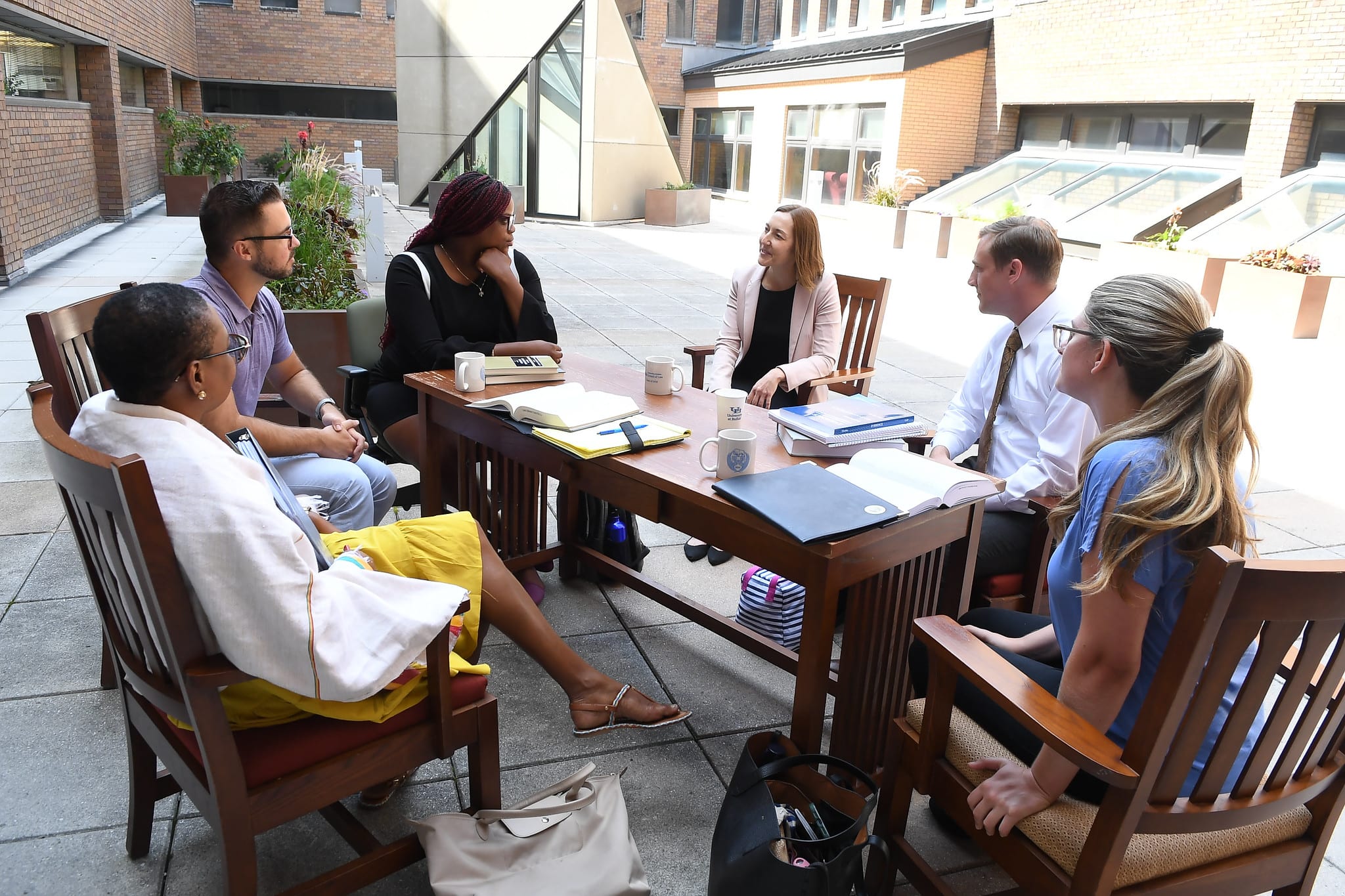 Associate Professor Heather Abraham, Director of the Civil Rights & Transparency Clinic, with her students circa 2021.