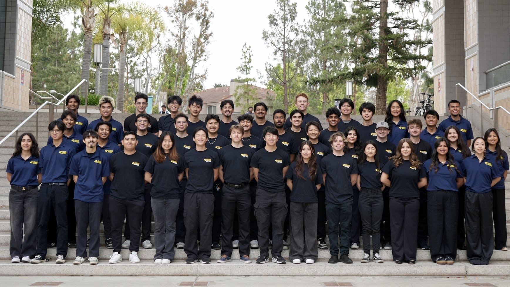 Anteater Formula Racing Team posing together on staircase