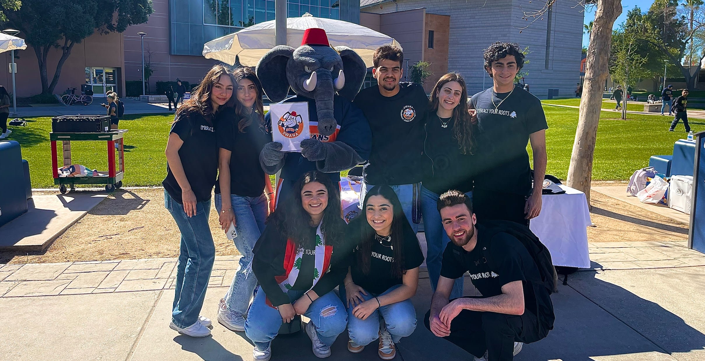 SWANA students with Tuffy on Titan Walk