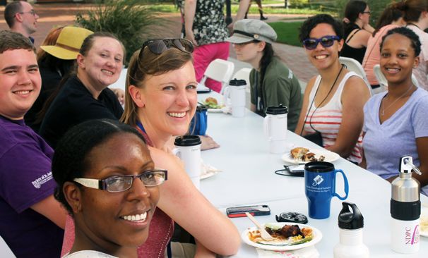 YTI summer academy scholars sharing a meal