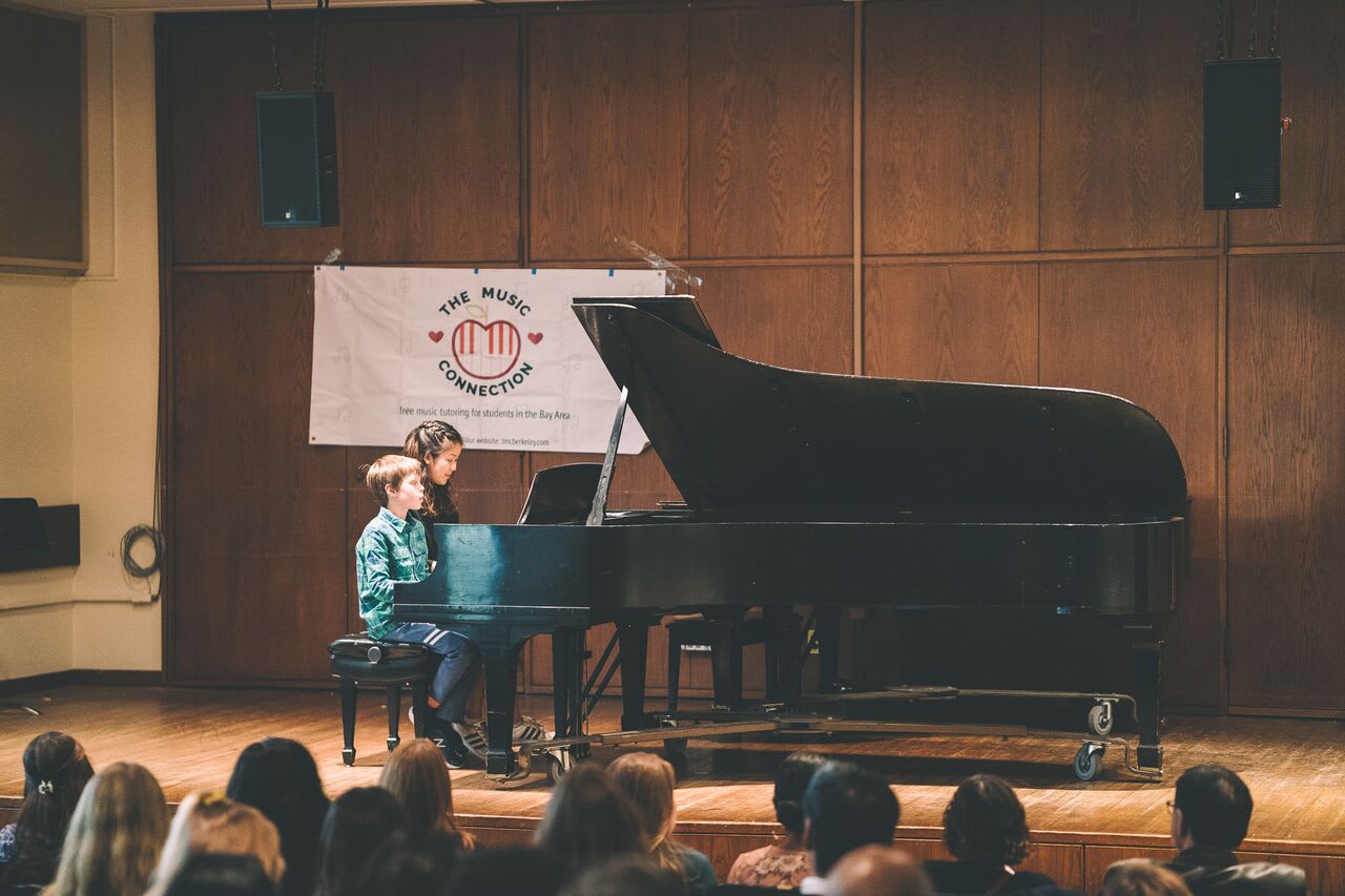 Our tutor performing with her student at our Fall 2018 Private Piano/Vocal Recital.