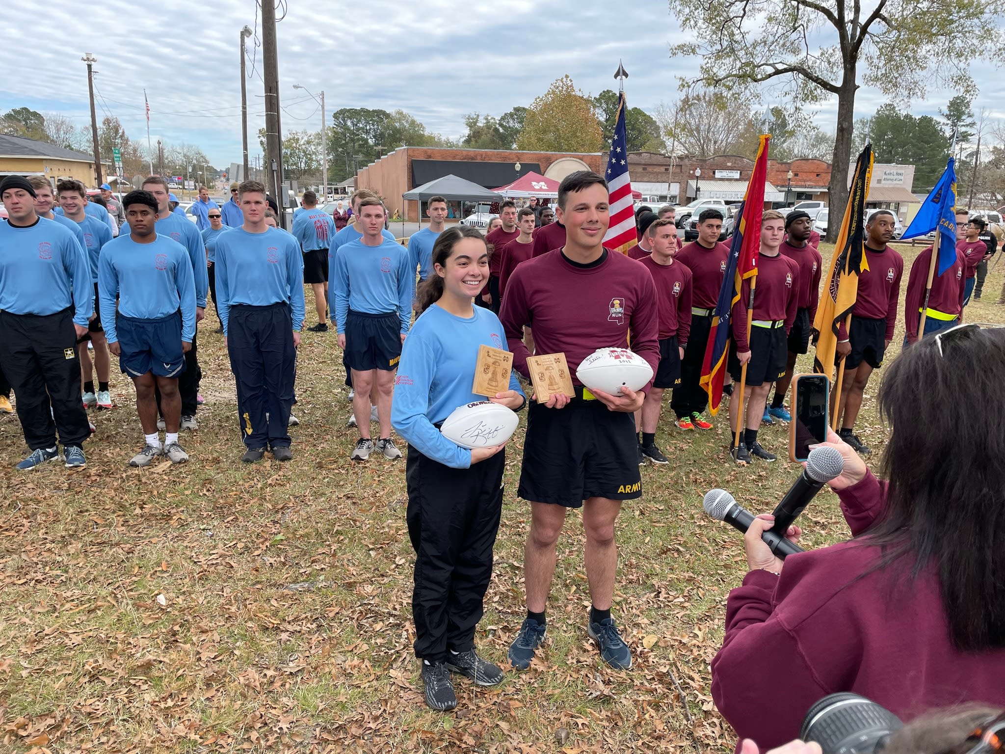 Army cadets meeting in Calhoun City with the game day ball.