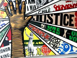 A compilation of different images relating to social justice. An hand stretches up, covering part of the collage