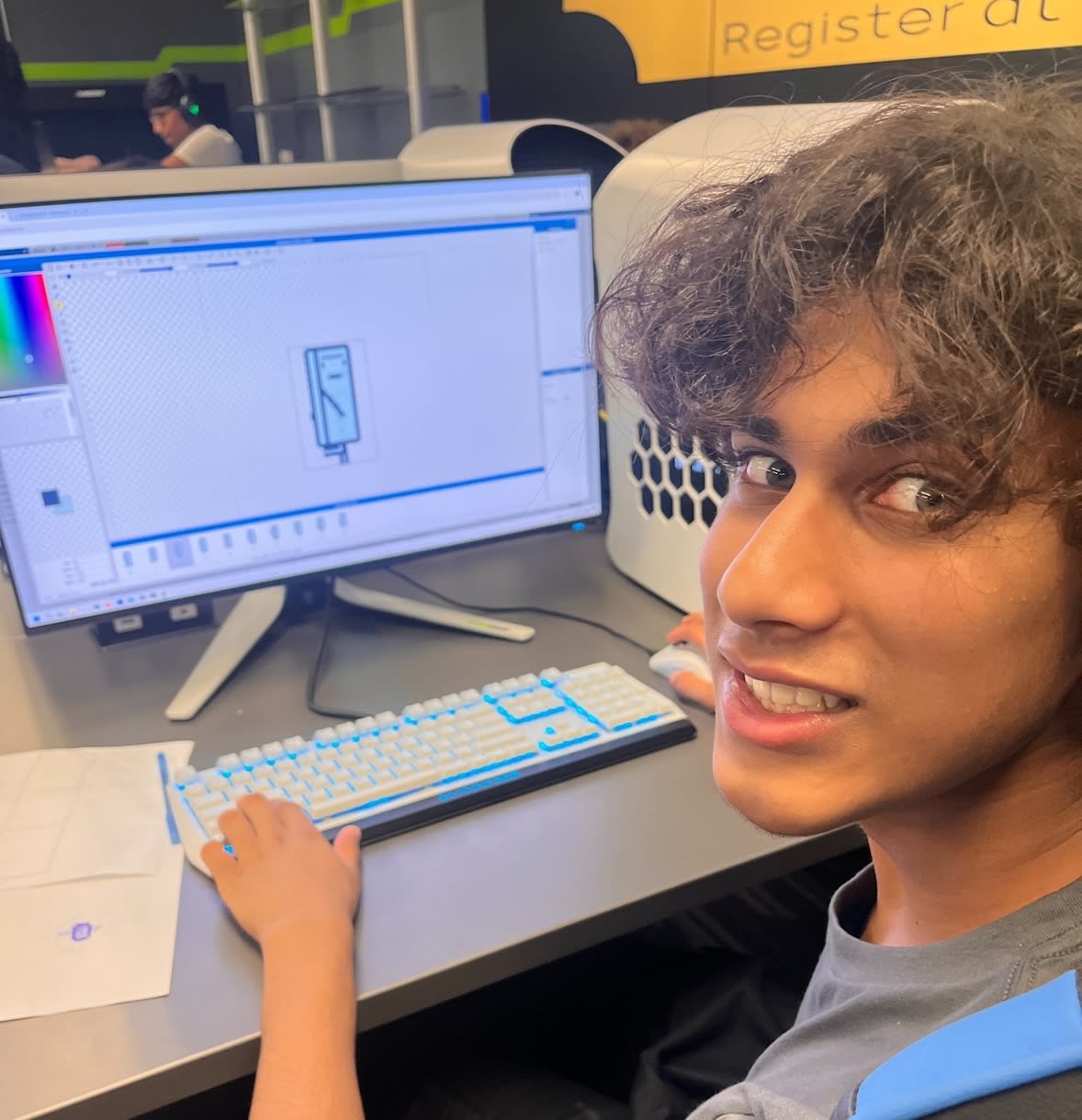 Game Design club member showing work