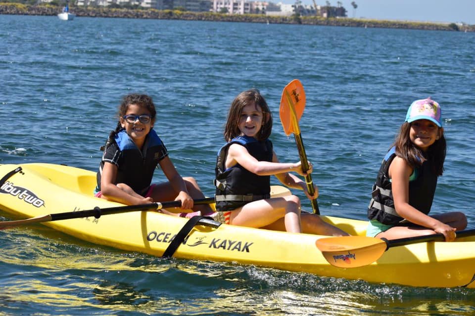 children kayaking