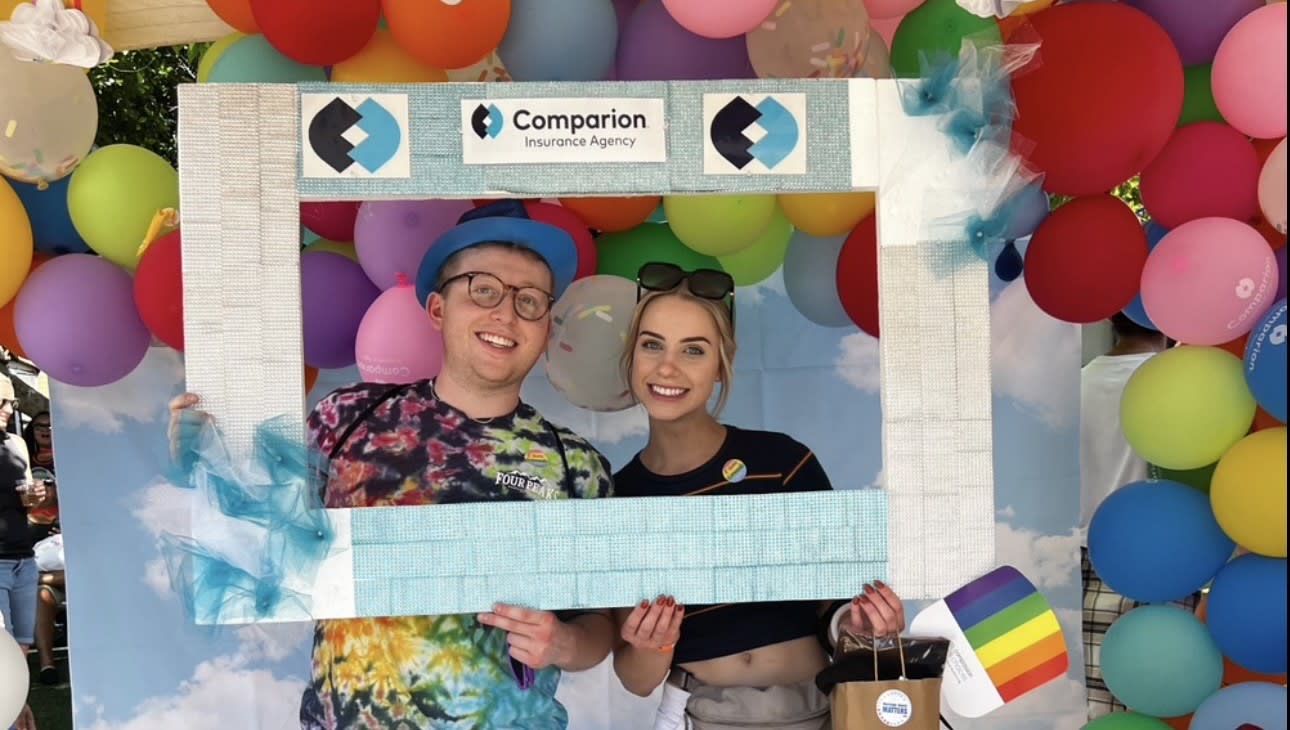 Pride Jacks members posing in a photo booth