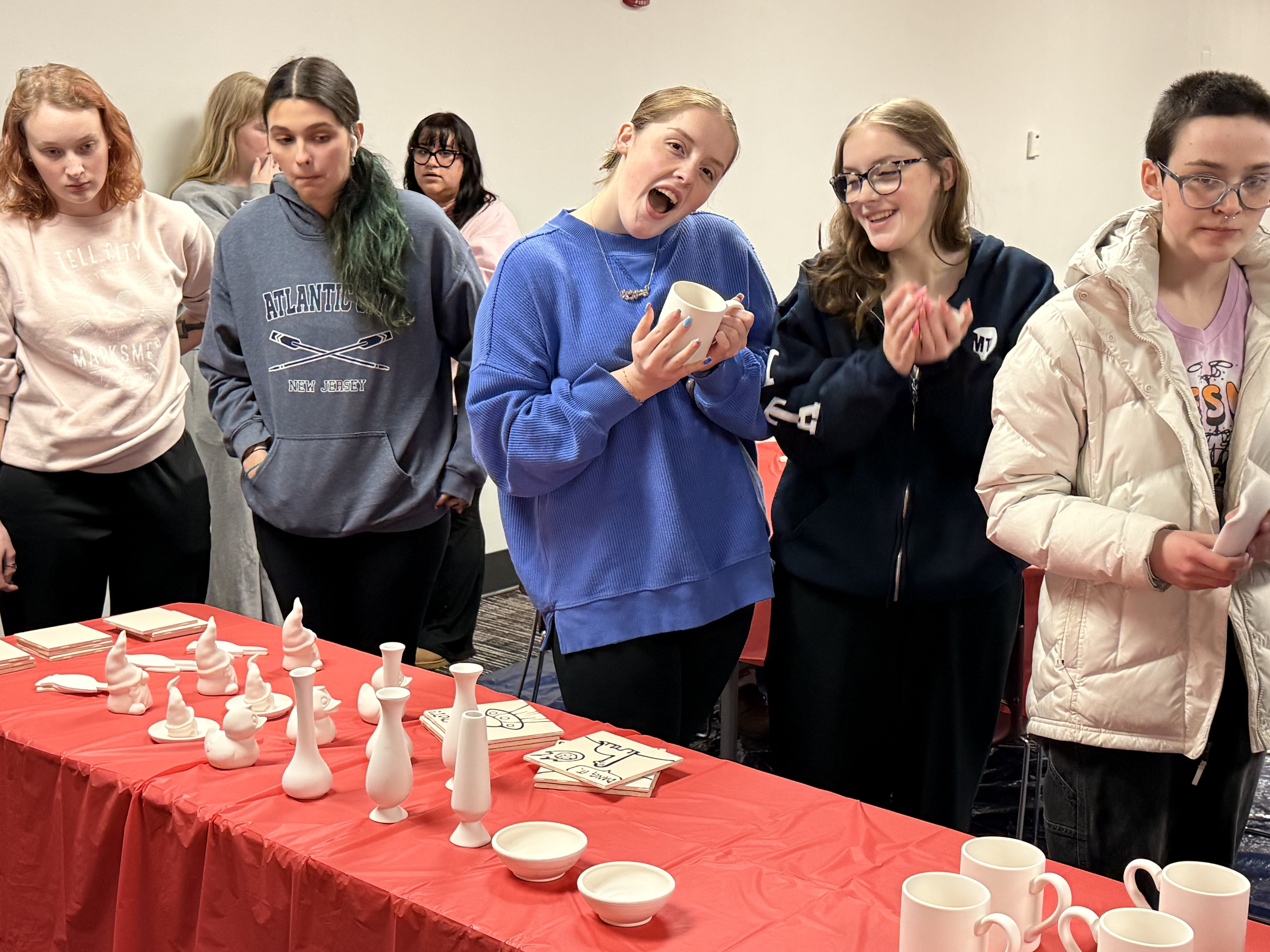 Students at Alliance for Disability Awareness club and DS pottery painting event