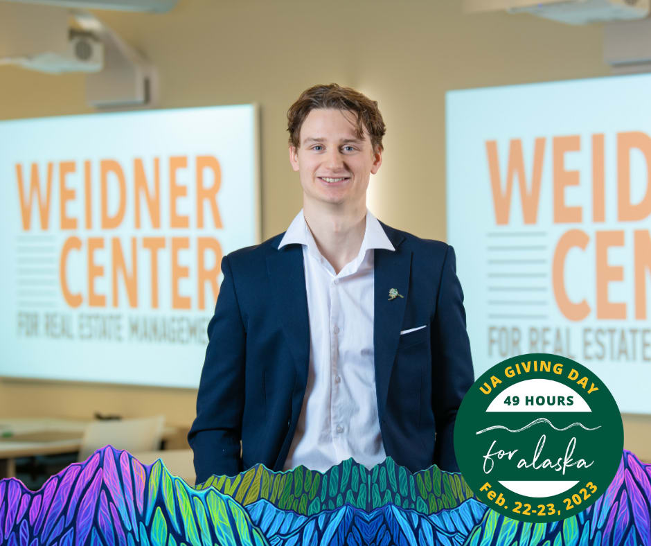 Magnus Noroey, College of Business & Public Policy student, standing in a suit, in the Weidner Center