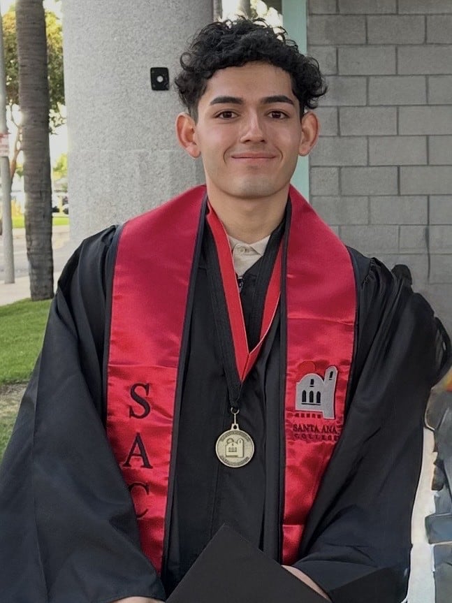 Headshot of Richard Rios in graduation gown