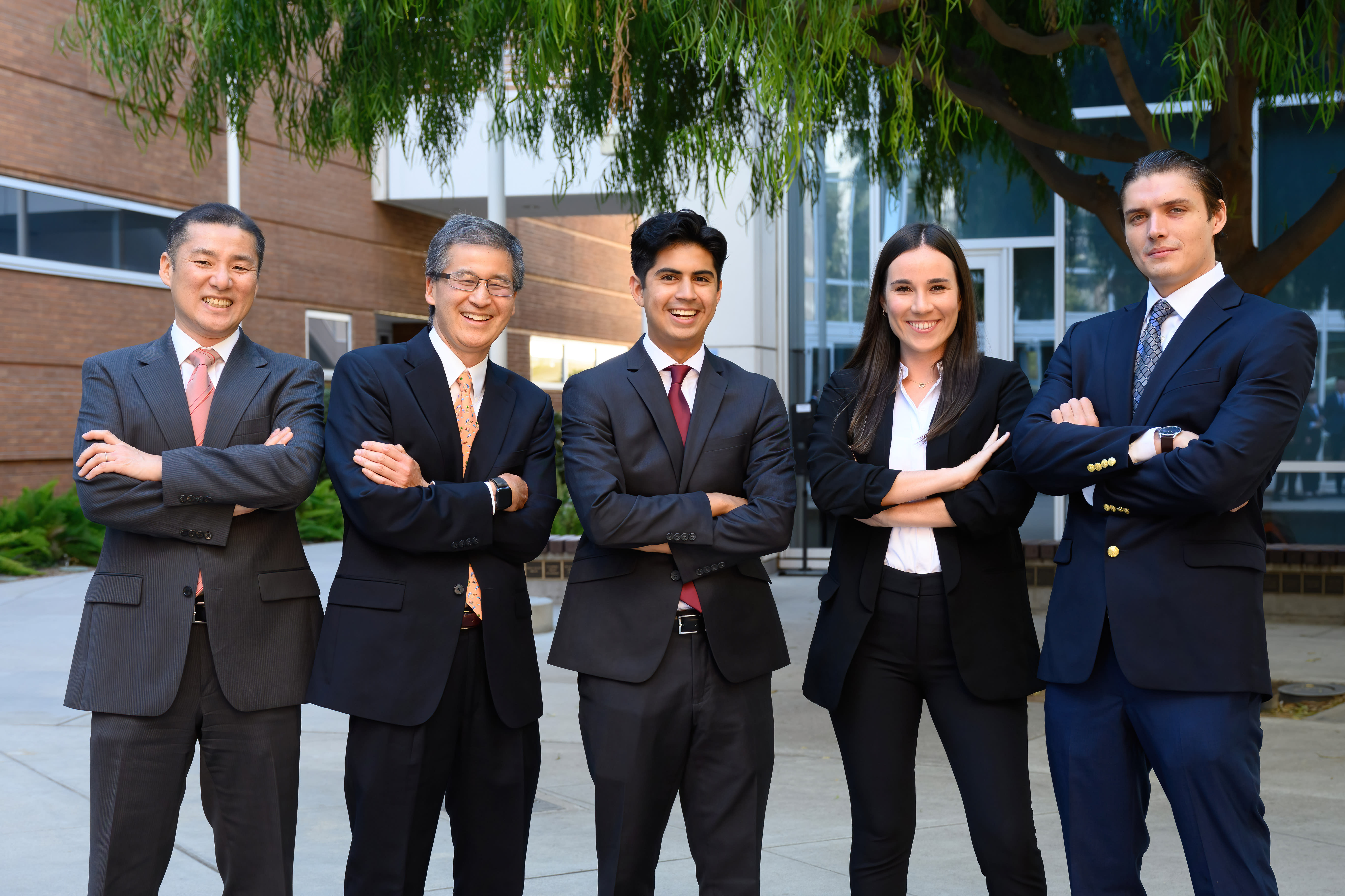 9 Titan Capital Management students in suits