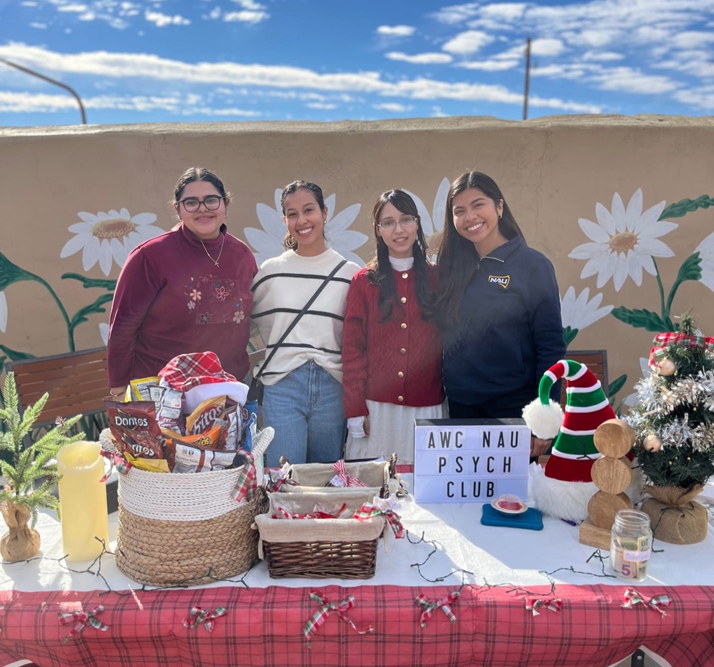 Psychology Club members working a table at an event