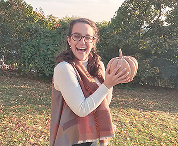 Katie with a pumpkin