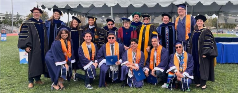American Studies students at graduation with faculty